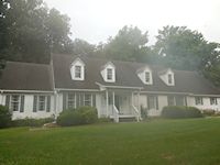 Before Asphault Roof soft washing in Easton